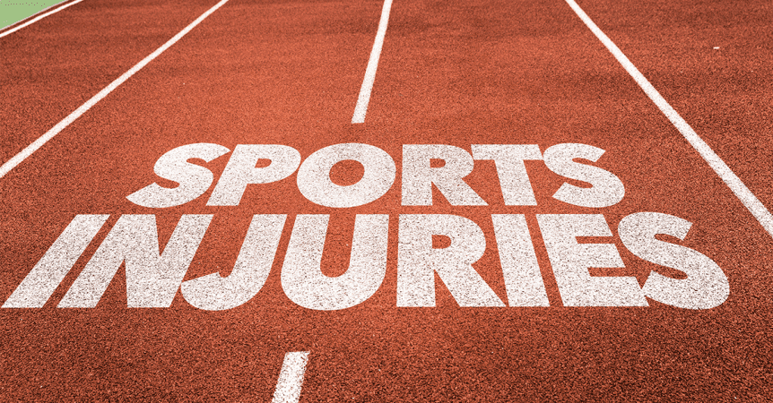 Sports injuries sign written on running track